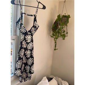 NEW! Mini dress black, with white floral print.